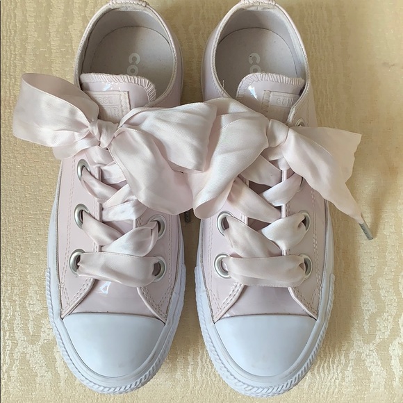 silver converse with pink bow